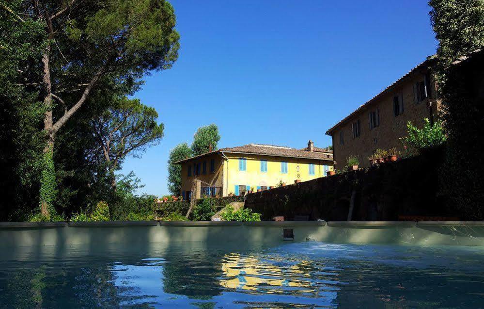 Bassetto Guesthouse & Apartments Черталдо Екстериор снимка